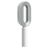 Self cleaning hair brush for women with one-key cleaning, anti-static bristles, and scalp-massage airbag design for smooth, tangle-free, healthy hair.